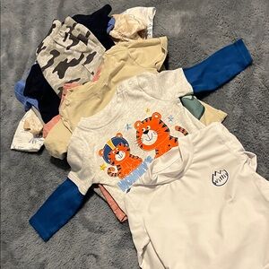Summer clothes, swim shirt, tshirts, onesies, and pants